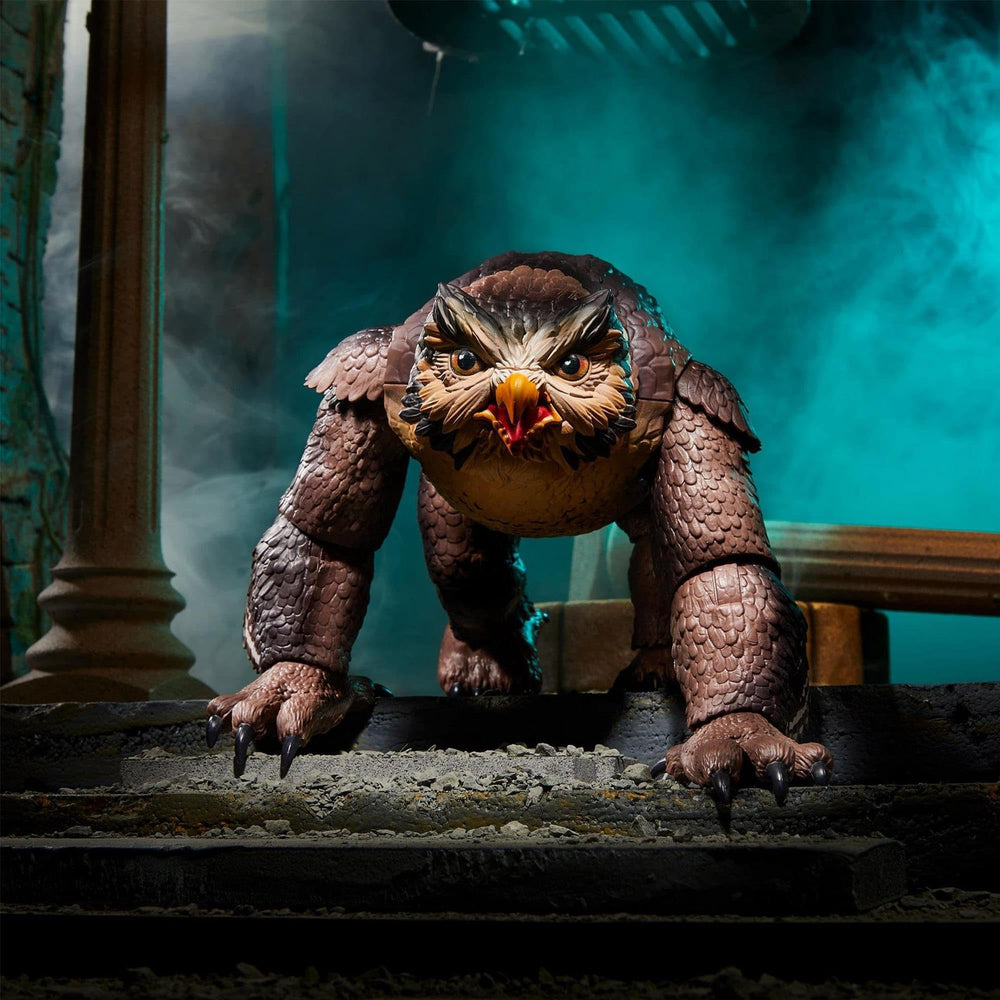Owlbear figurine on a clear stand for display