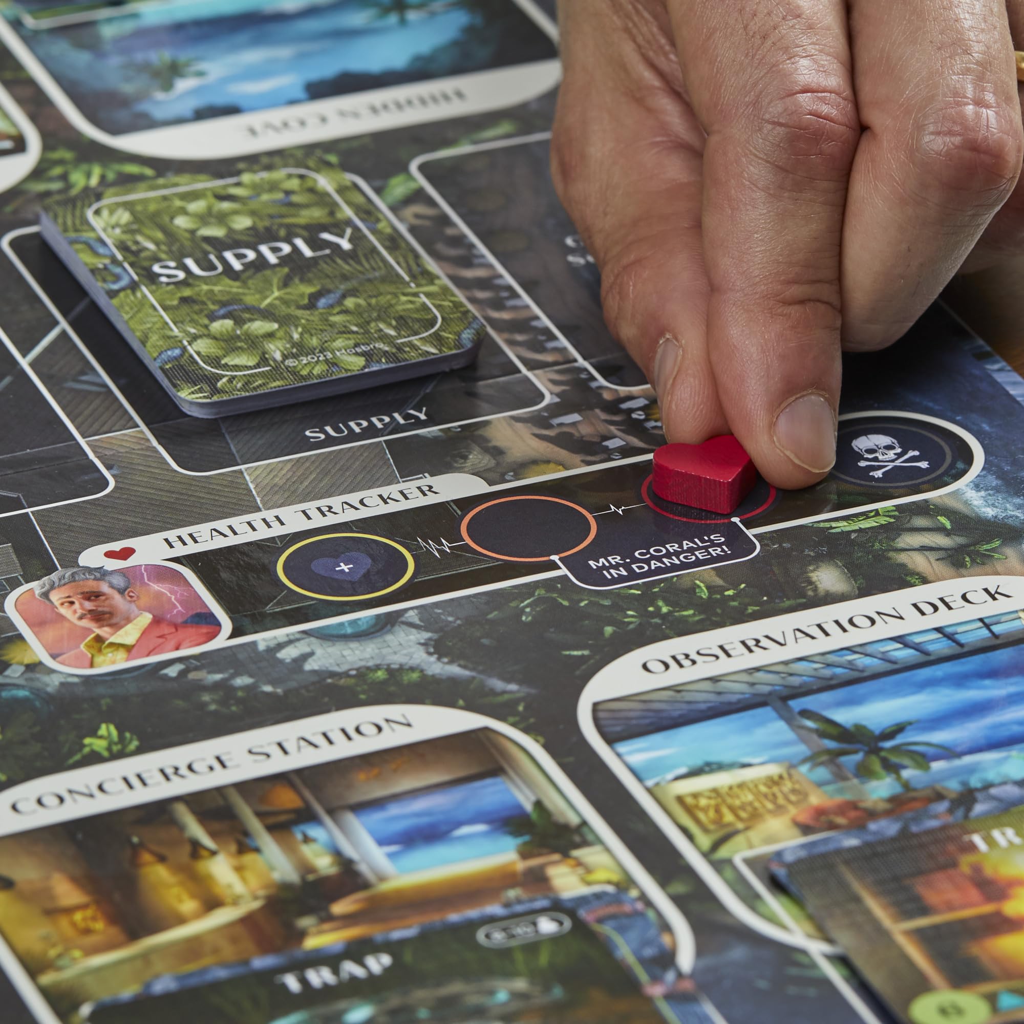 Hasbro Clue Conspiracy rule book guides players through secret roles and traps.