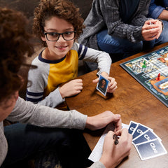Hasbro Gaming Clue illustrated board showcases glamorous setting.