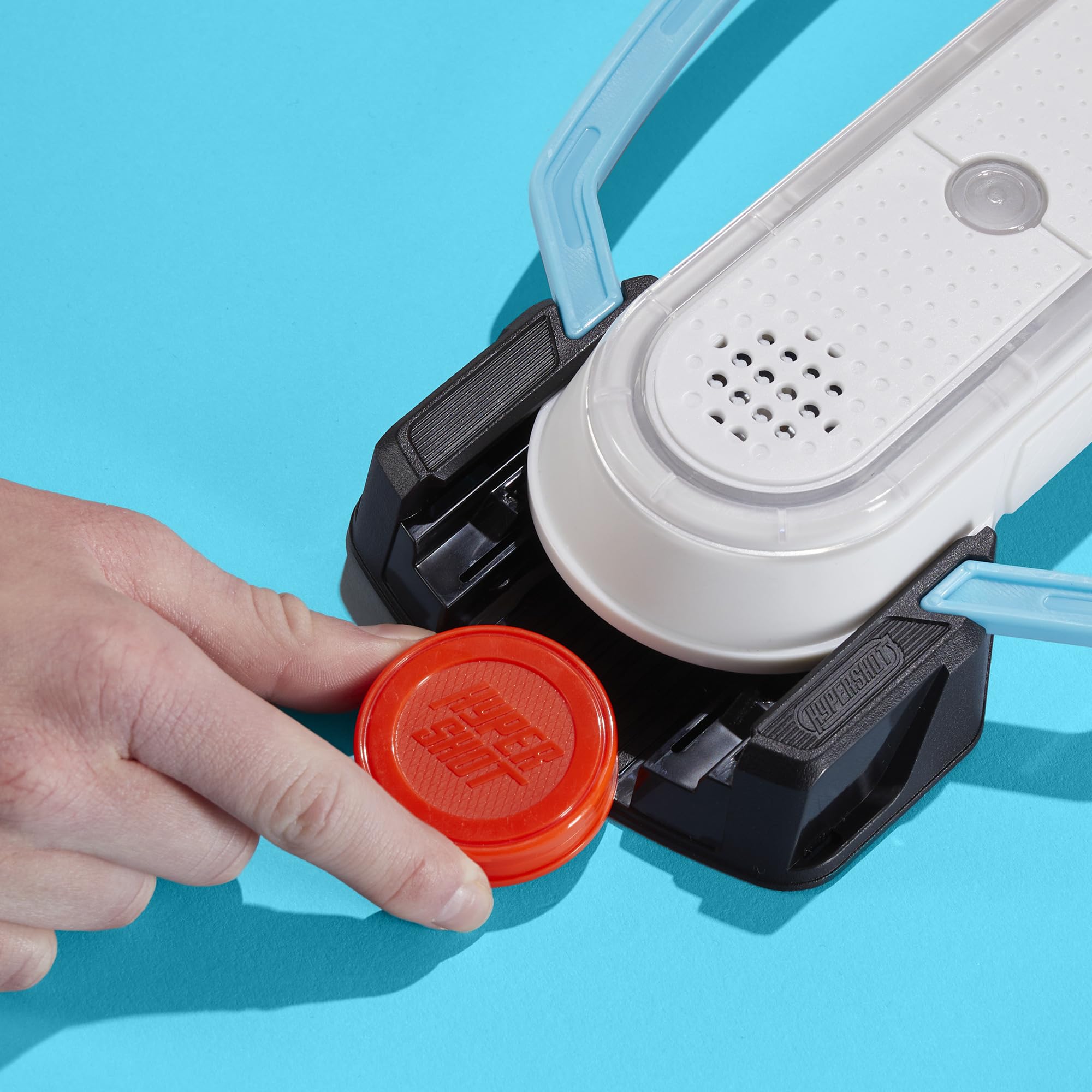 Hasbro Gaming Hypershot included pucks and rails ready for immediate play.