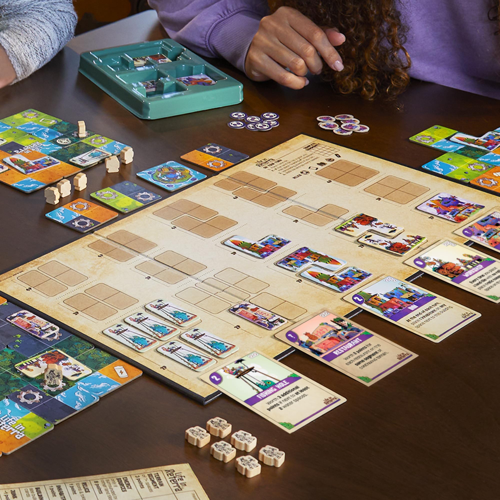 Hasbro Gaming Life in Reterra building-cards reveal powers that affect scoring