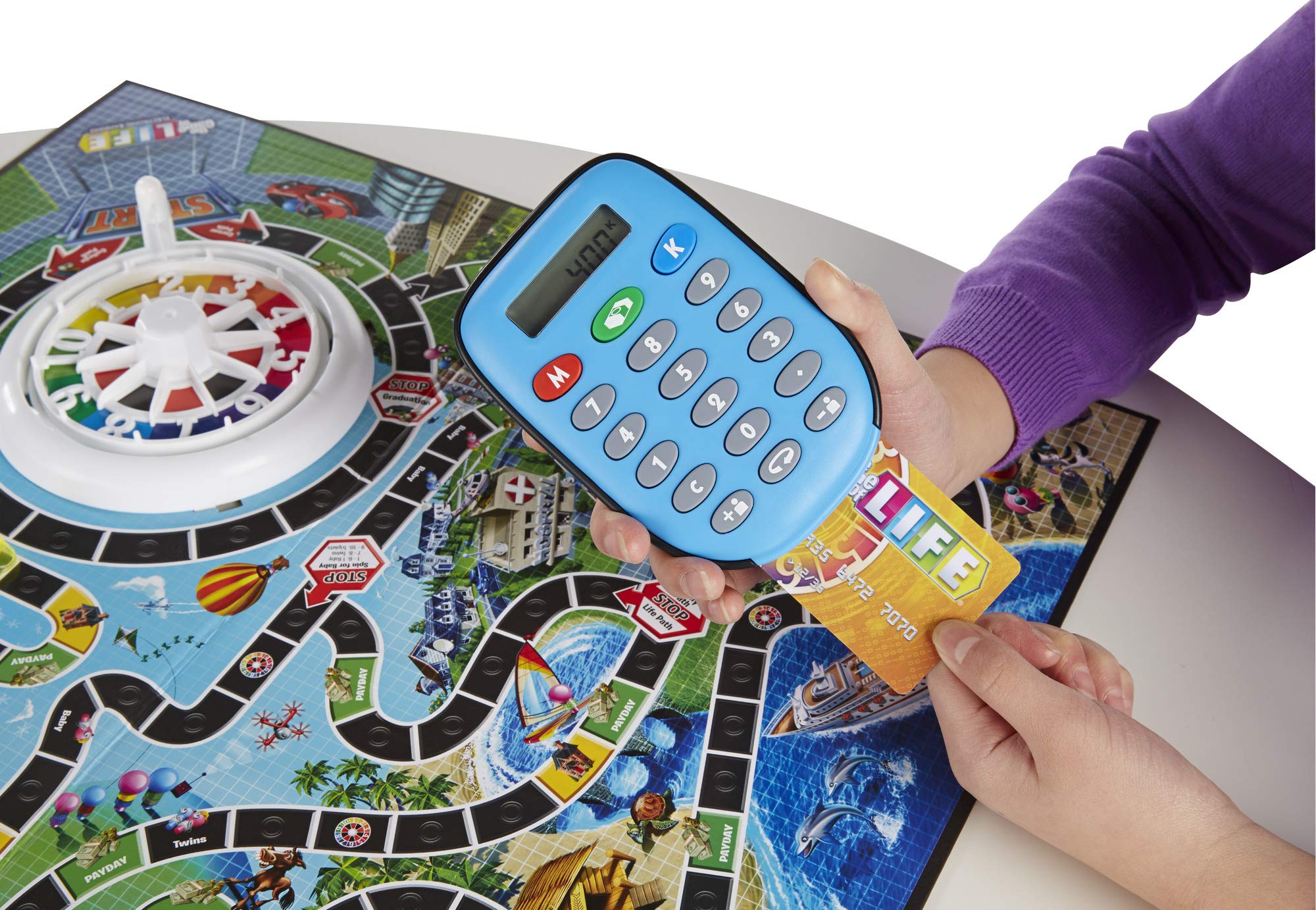 Hasbro Gaming The Game of Life spin-to-win spaces add prize moments