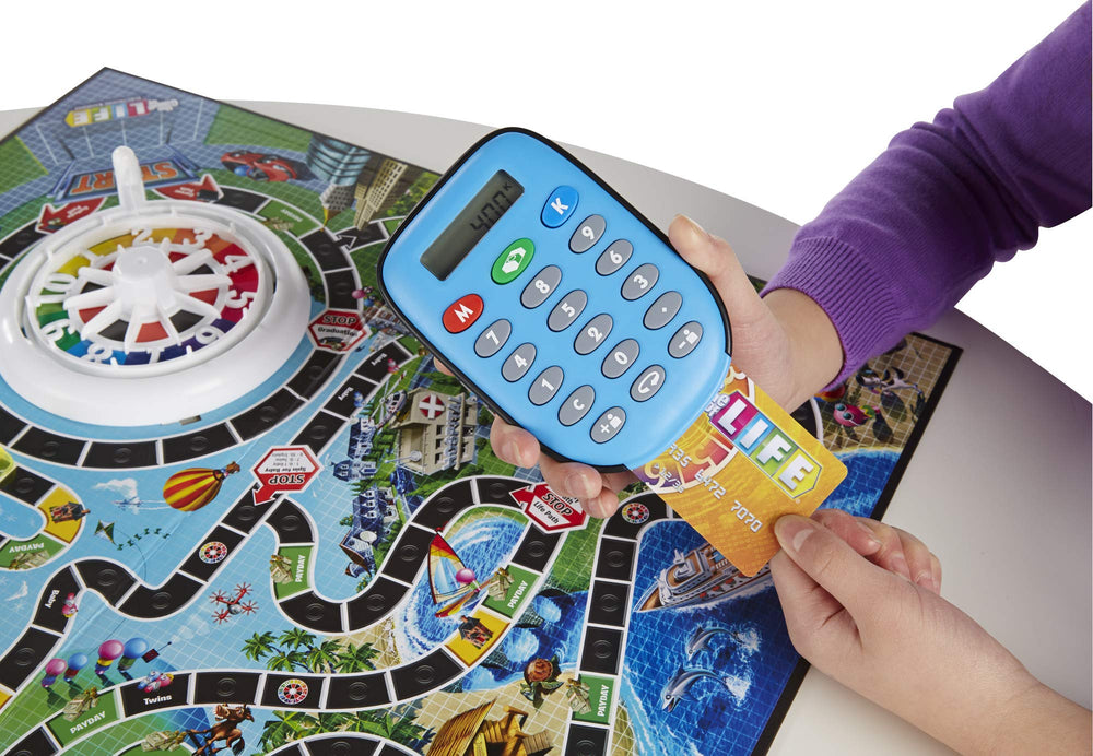 Hasbro Gaming The Game of Life spin-to-win spaces add prize moments