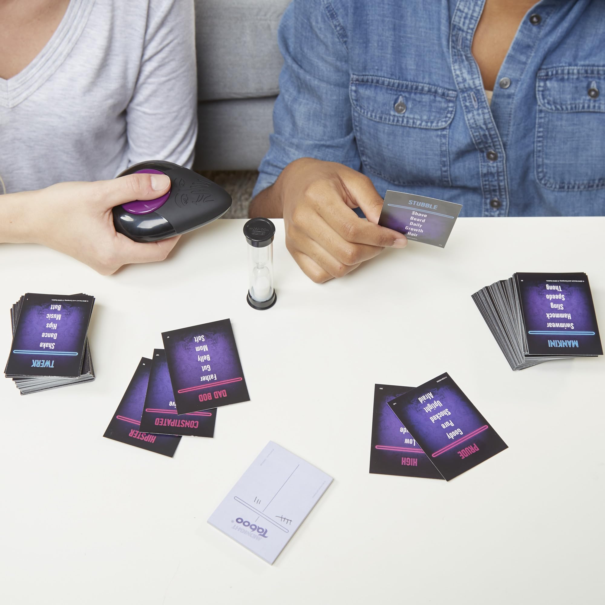 Hasbro Gaming Midnight Taboo timer powers quick rounds for high-energy clues