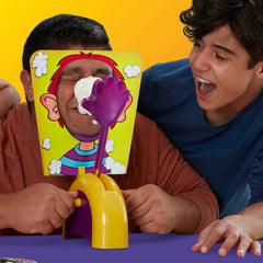 Hasbro Gaming Pie Face Game scoring points, encourages careful turns.