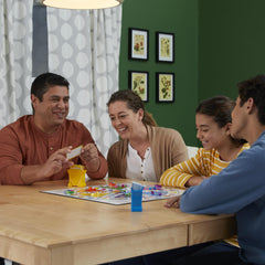 Hasbro Gaming Trivial Pursuit Family Edition movers in bright colors.