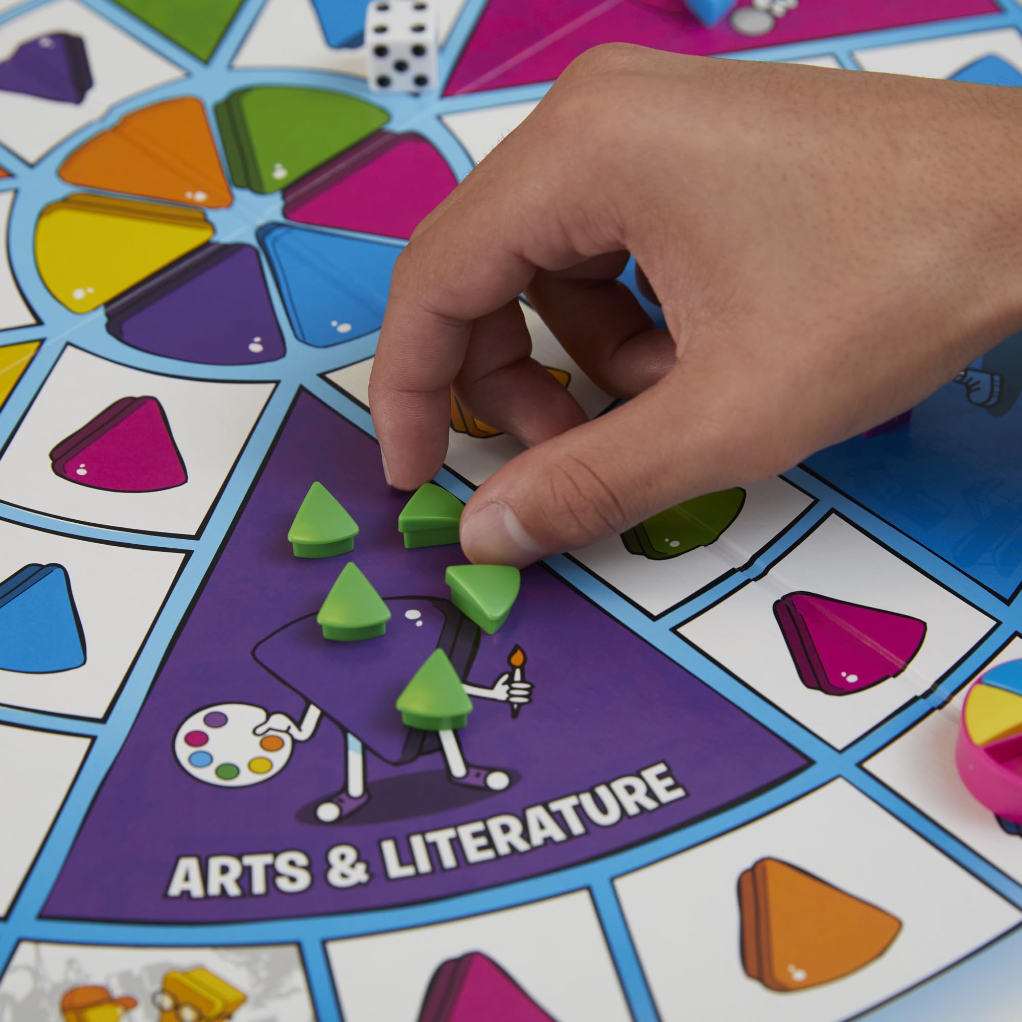 Hasbro Gaming Trivial Pursuit Family Edition wedges shown for collecting six.