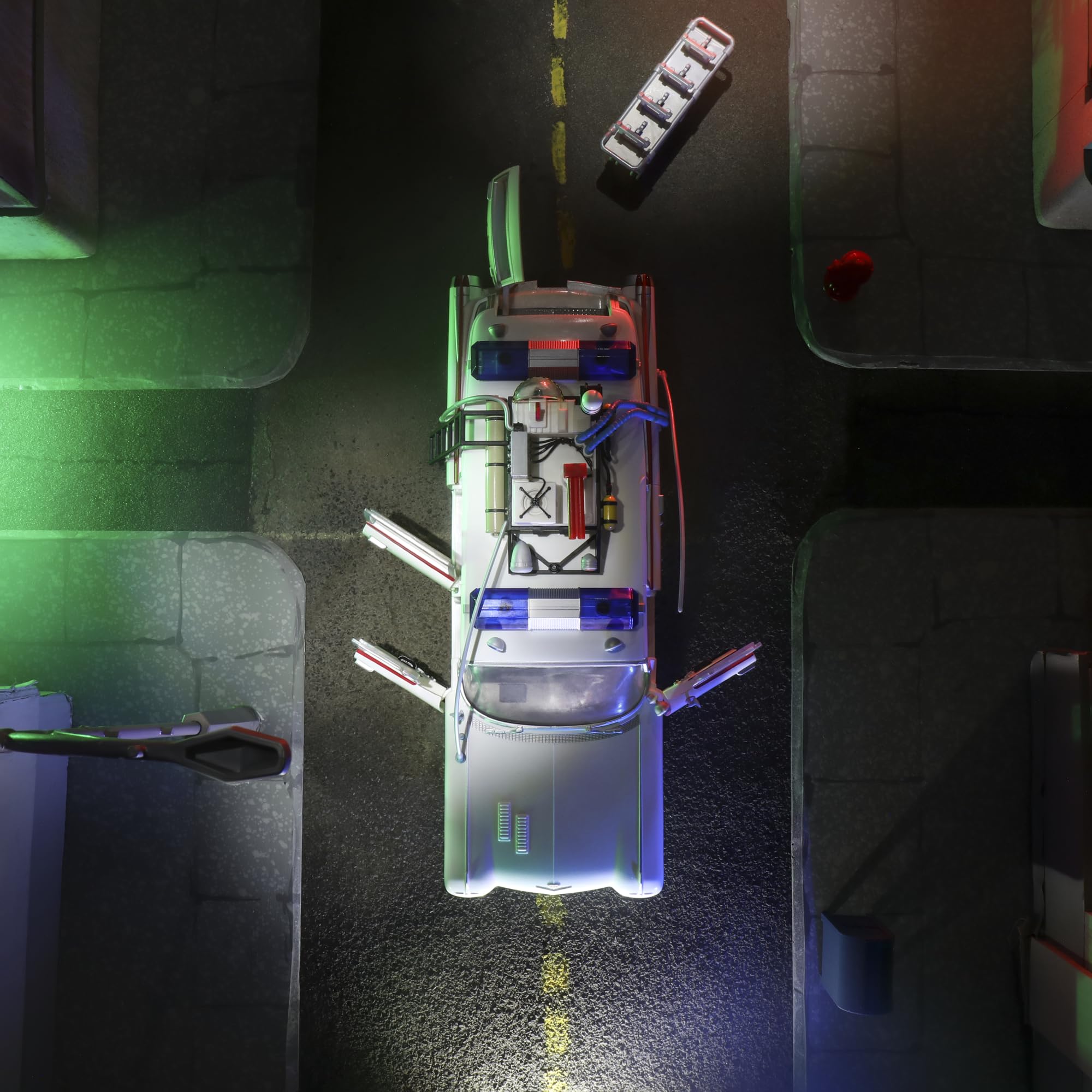 Hasbro Ghostbusters Ecto-1 1984 gurney slide-out adds play options.