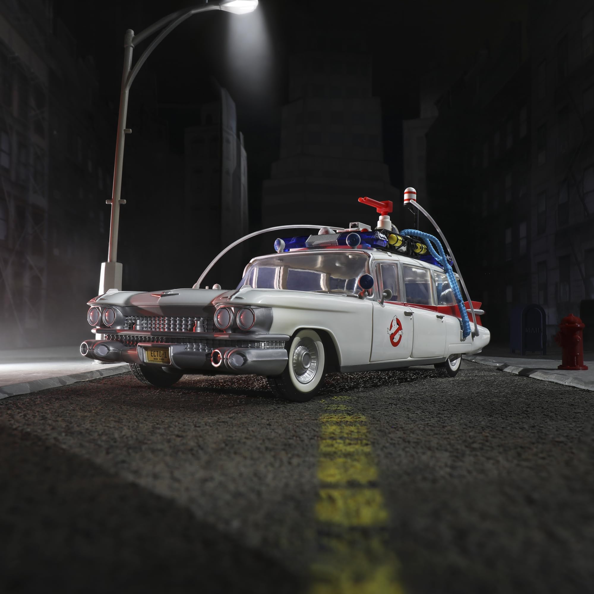Hasbro Ghostbusters Ecto-1 1984 open doors reveal interior details.