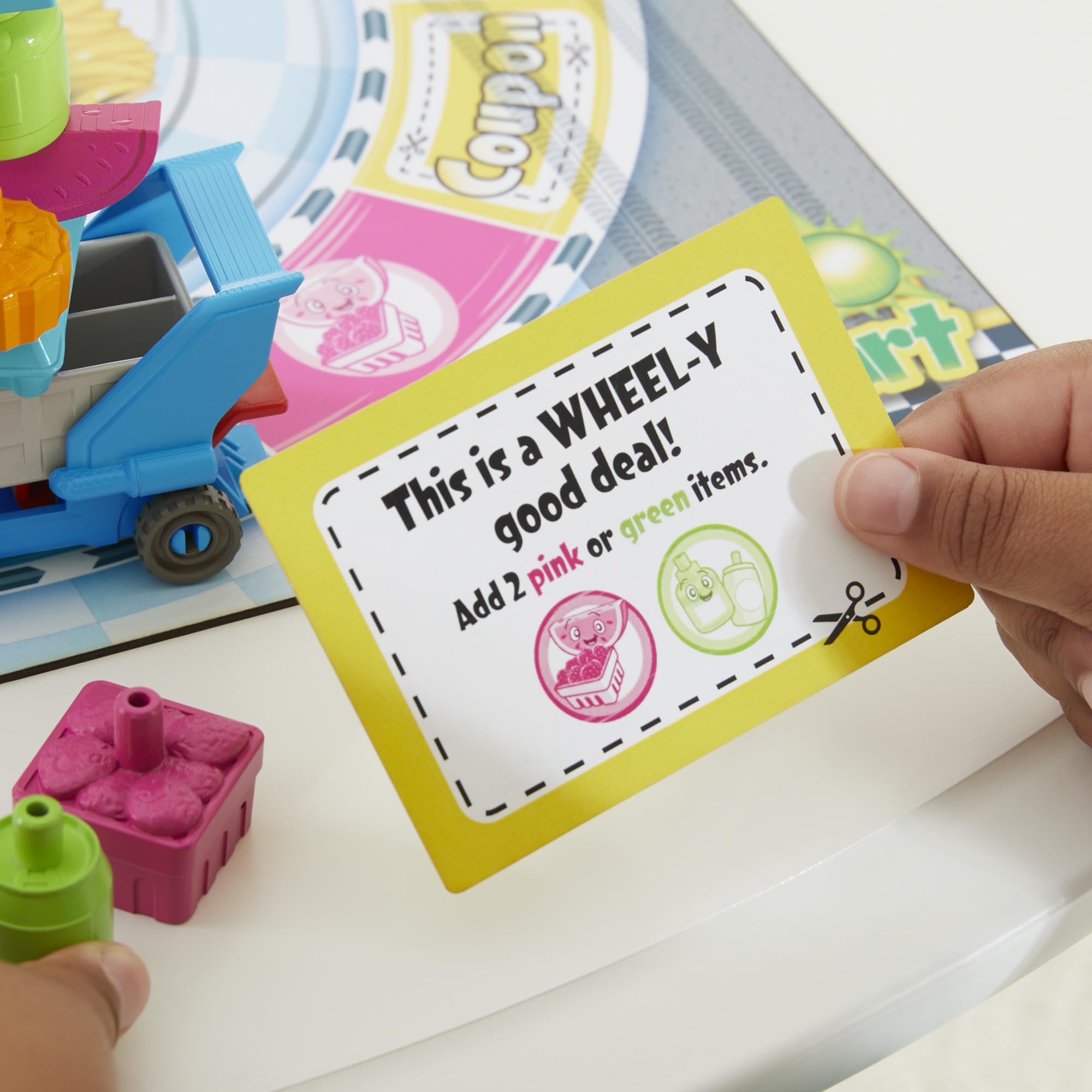 Hasbro Grocery Go Karts 32-connectable-groceries, enabling varied stacking across rounds.