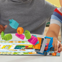 Hasbro Grocery Go Karts dice-roll action, illustrating simple color-matching for young players.