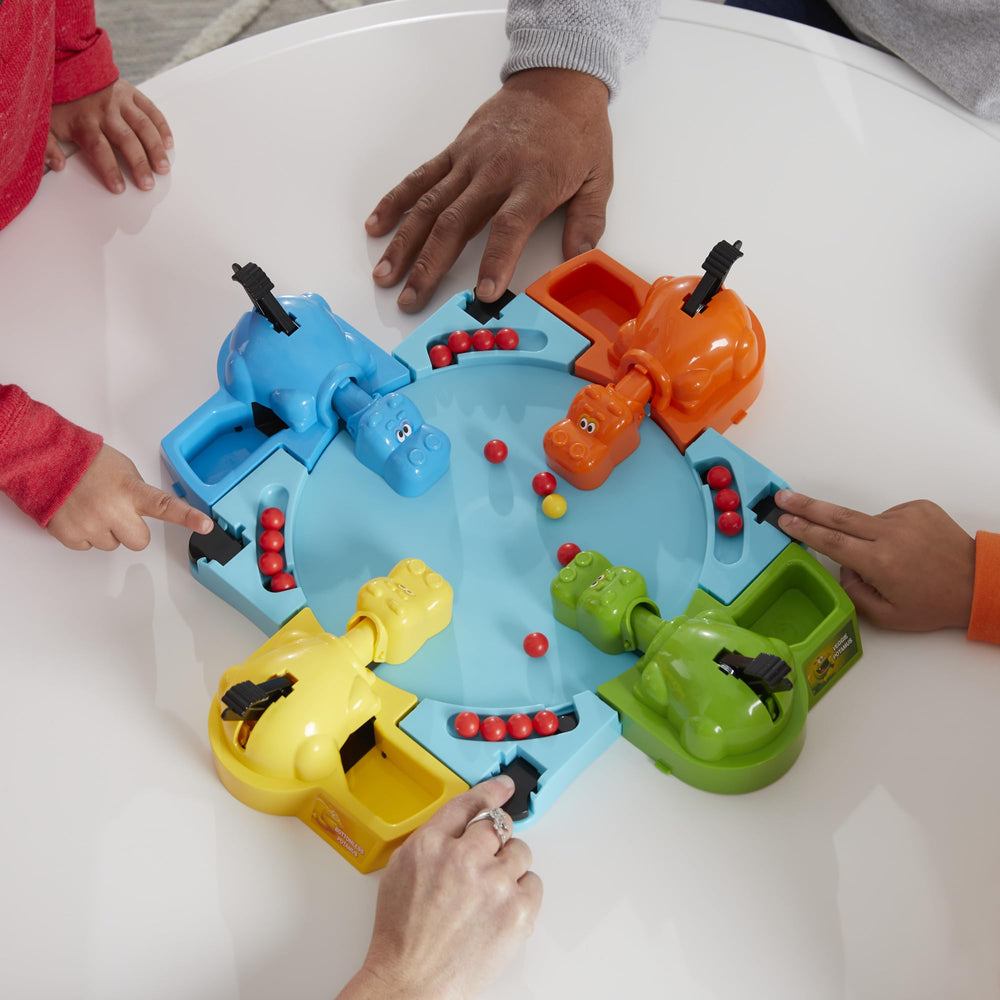 Hasbro Hungry Hungry Hippos golden marble signals potential win.