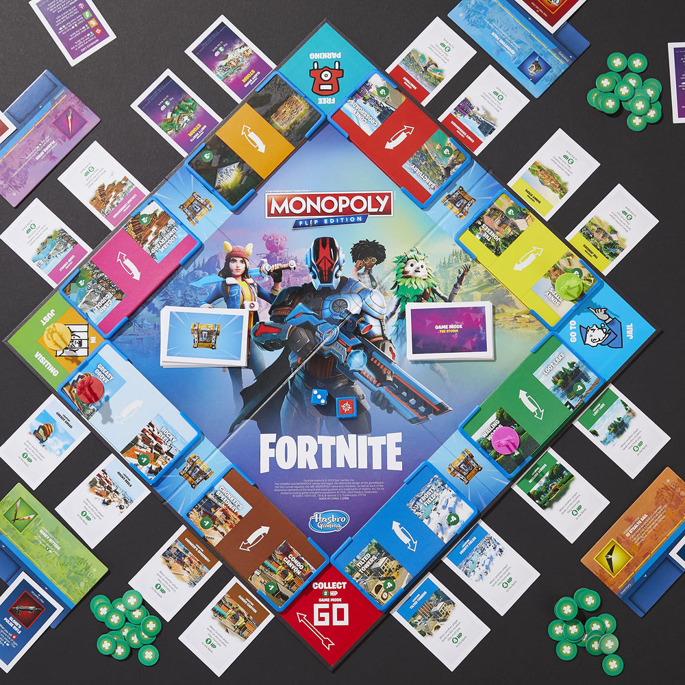 Hasbro Monopoly Flip Edition Health Points chips track battle progress.