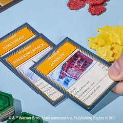Ages 8+ label and welcoming design of Hasbro Monopoly Harry Potter Edition.