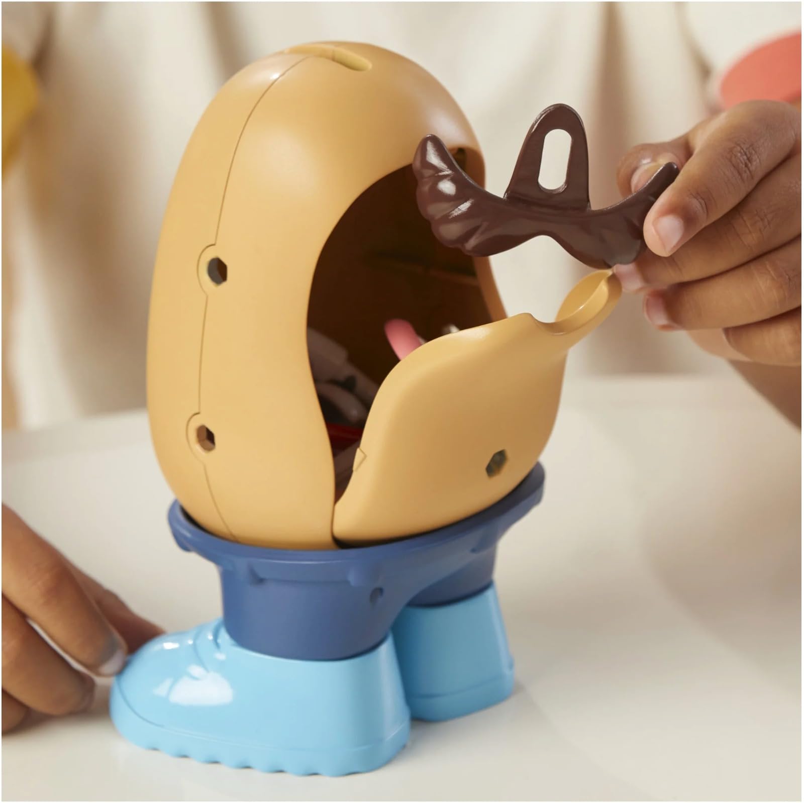 Hasbro Playskool Mr Potato Head hat accessory sparks playful transformations.