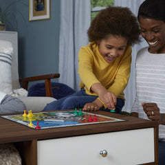 Hasbro Gaming Sorry! family playing in living room demonstrating fun group interaction