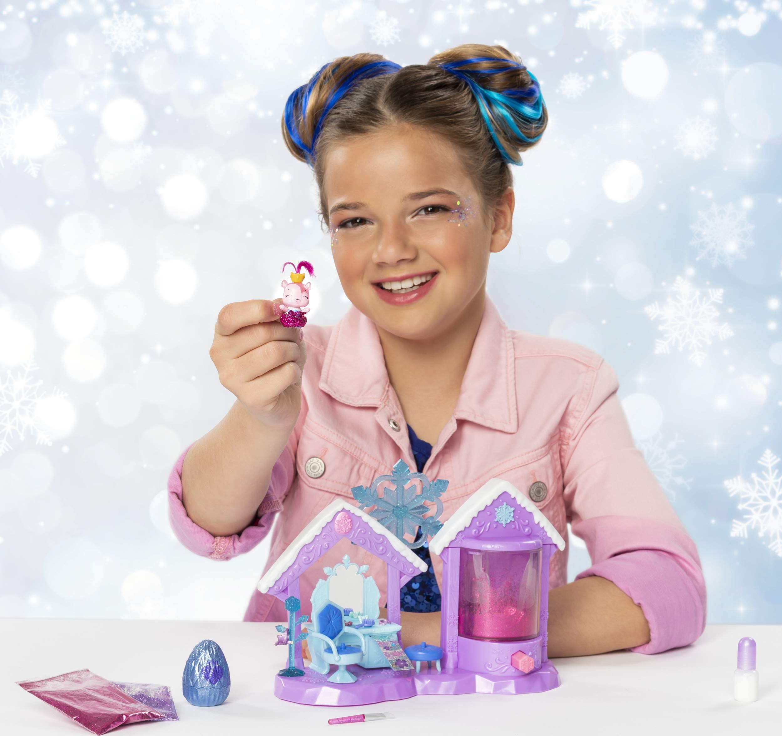 Hatchimals Glitter Salon Playset nine exclusive accessories on display stand.
