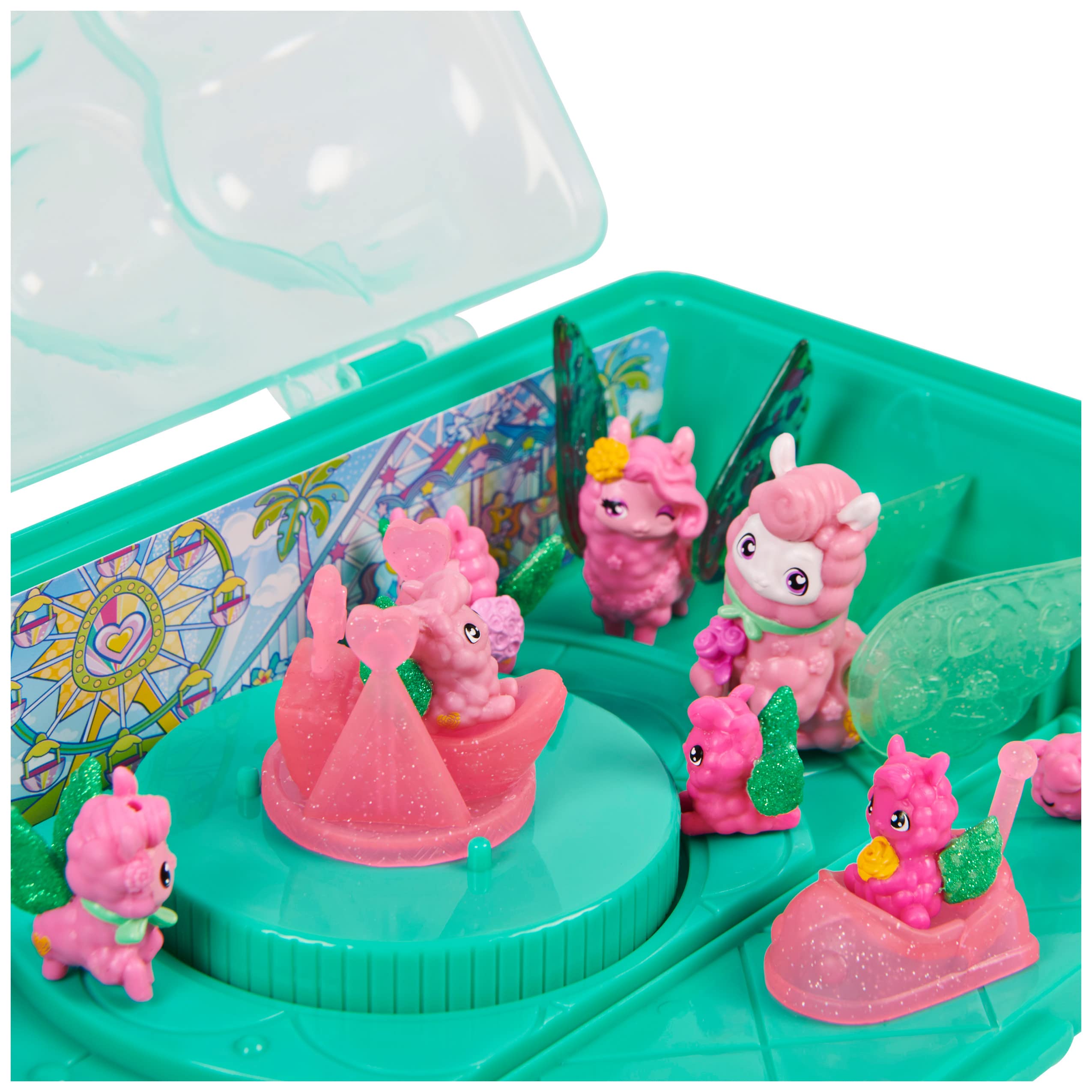 Themed backdrop enhances immersive Hatchimals park-inspired pretend play.