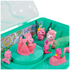 Themed backdrop enhances immersive Hatchimals park-inspired pretend play.