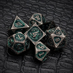 Haxtec metal dice featuring winged dragon design for cinematic moments