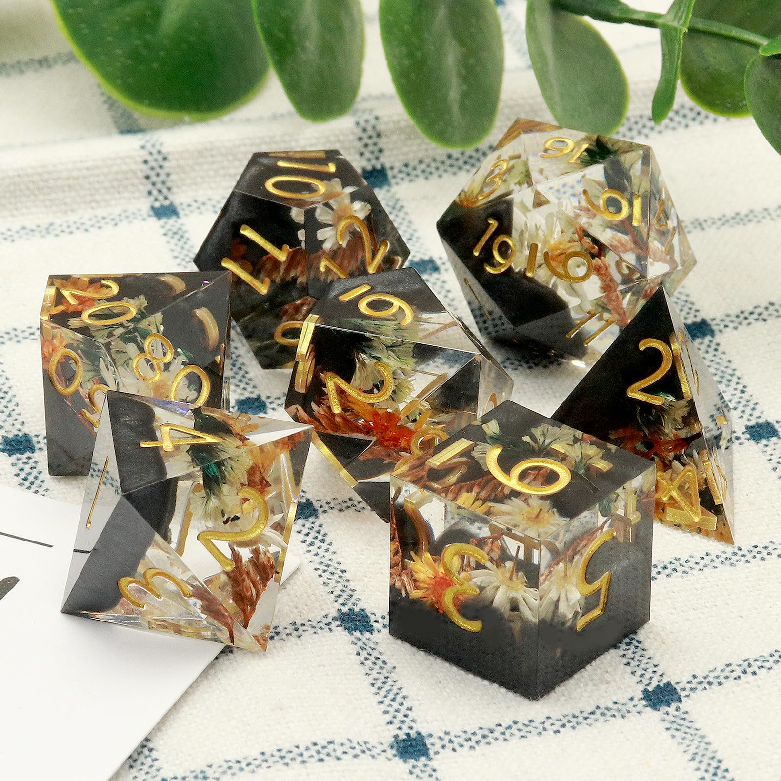 Haxtec flower-pattern resin dice add visual flair to game nights.