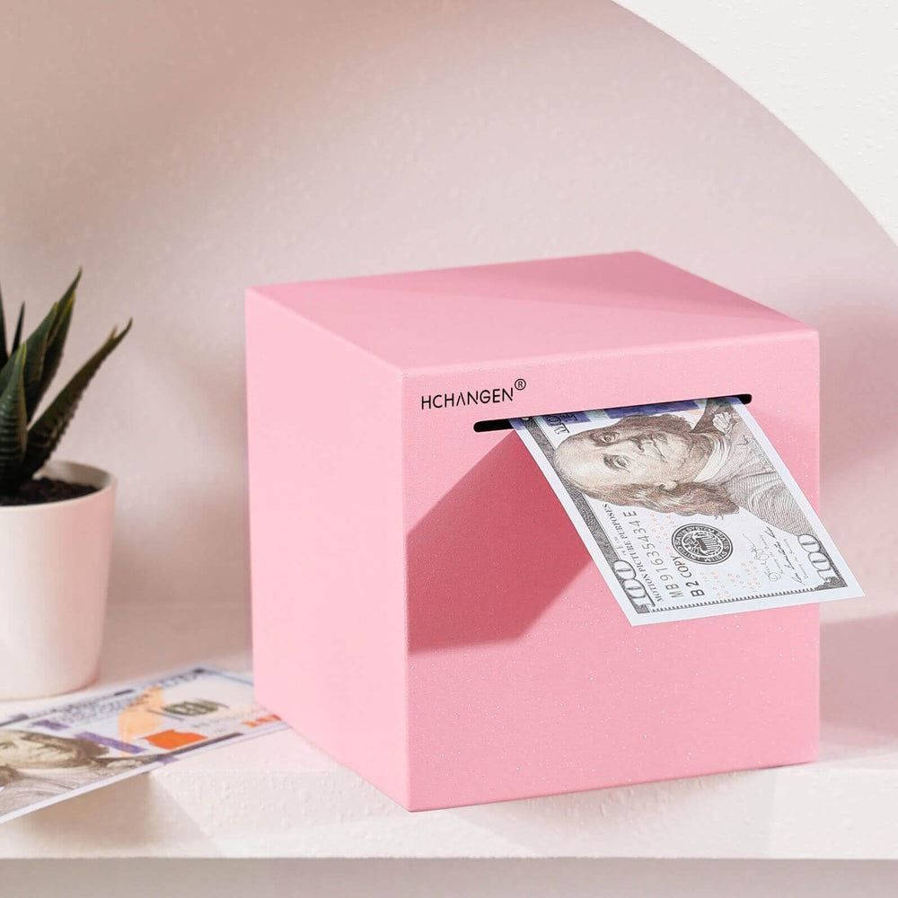 Close-up of HCHANGEN pink piggy bank showing premium brushed finish