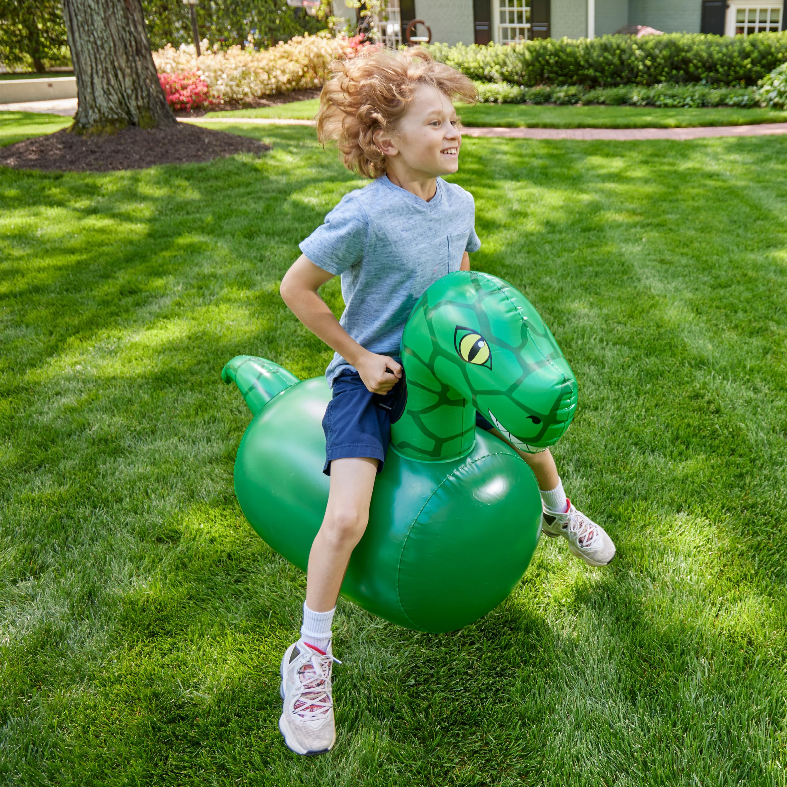 HearthSong Hop N Go Dino bouncer in backyard play for kids 5 and up.