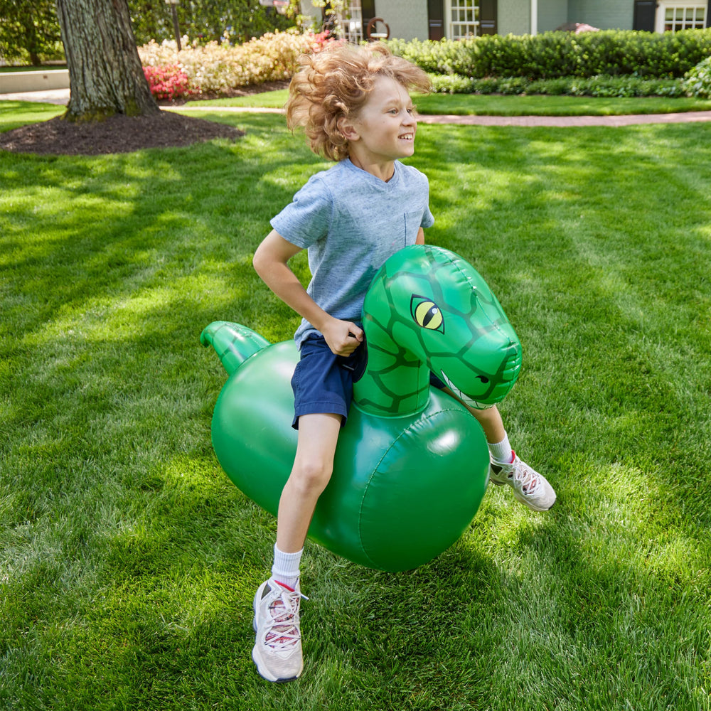 HearthSong Hop N Go Dino bouncer in backyard play for kids 5 and up.