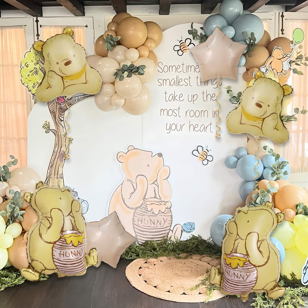 Heboland Winnie Pooh baby shower decor setup shines in photos.