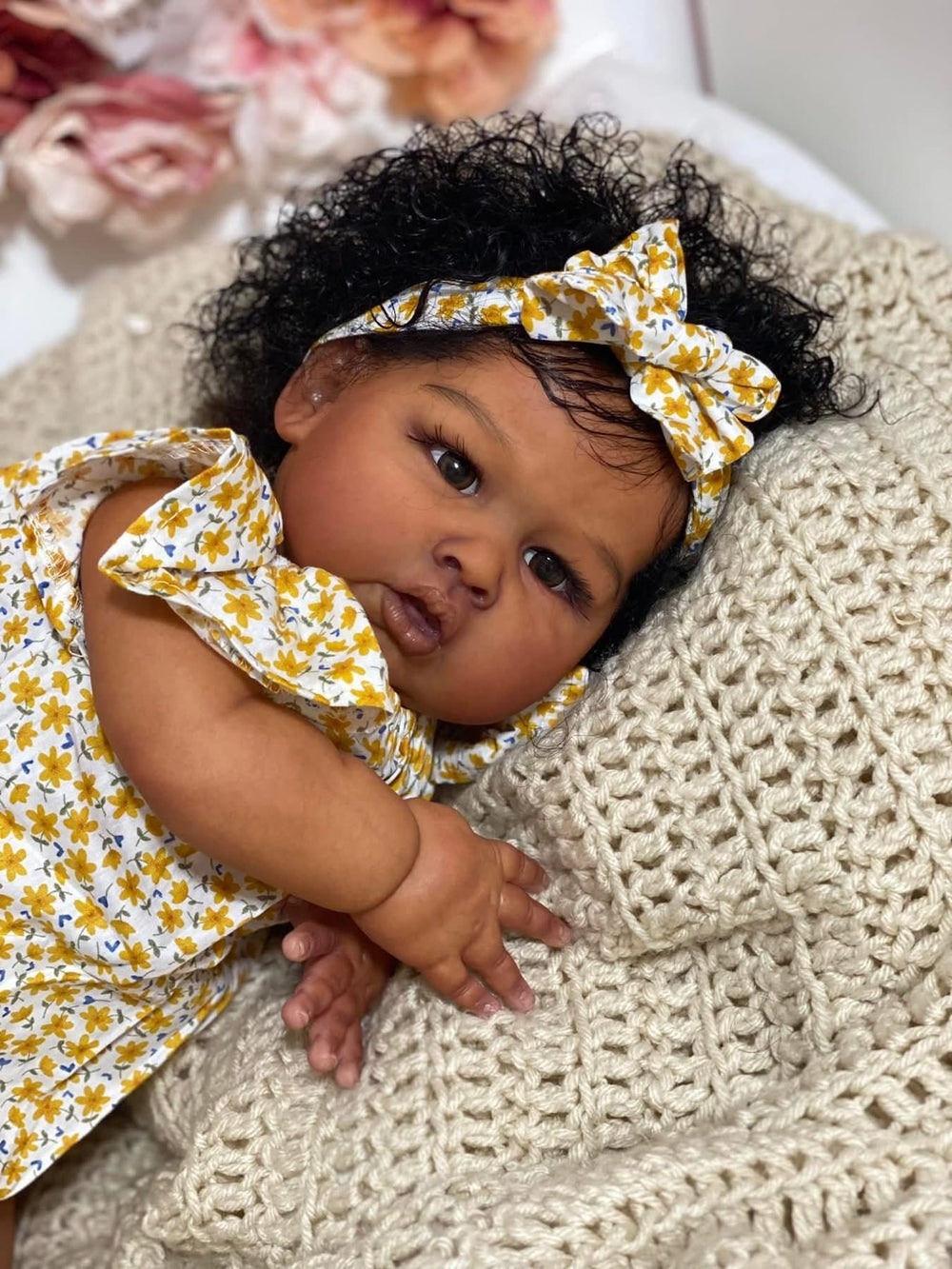 Hengluck reborn baby doll soft body material offers gentle cuddling and posing.