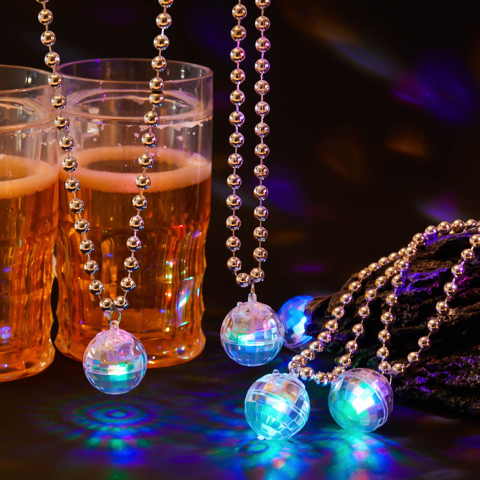 Henoyso disco ball necklaces with wearable-light effects for nighttime celebrations.