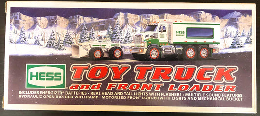 Hess 2008 toy truck with front end loader in an action play scene for creative pretend work.