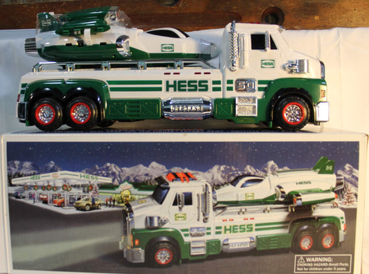 Hess flatbed truck chrome detailing and emblem highlight premium craftsmanship.