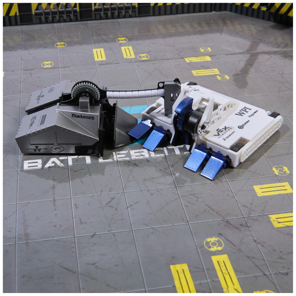Protective arena walls enclosing a BattleBot duel.