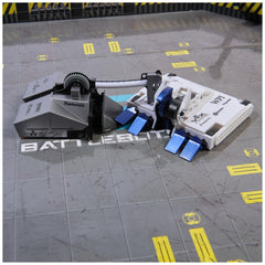 Protective arena walls enclosing a BattleBot duel.