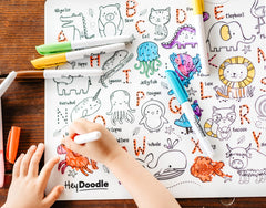 HeyDoodle travel-friendly toy shown in a backpack for on-the-go fun