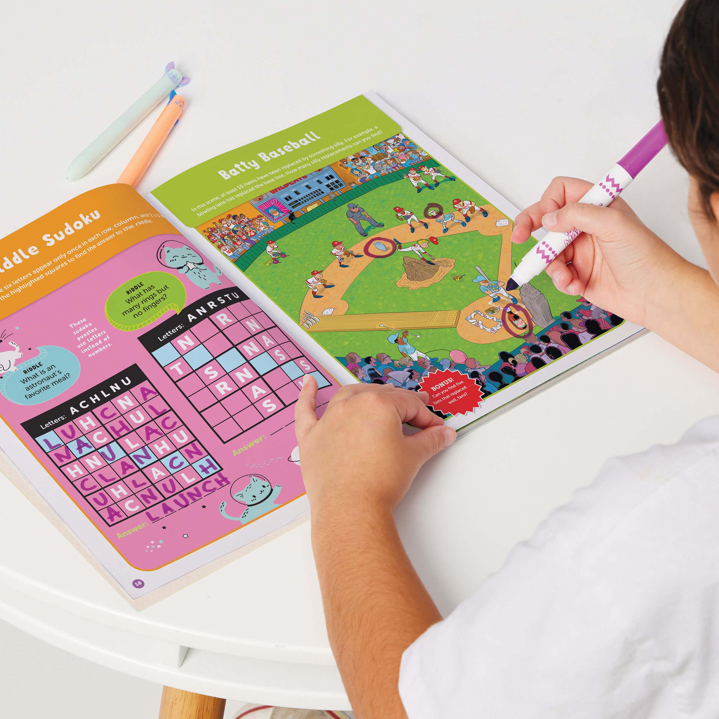 Portable puzzle collection by Highlights 2026 set for kids on the go
