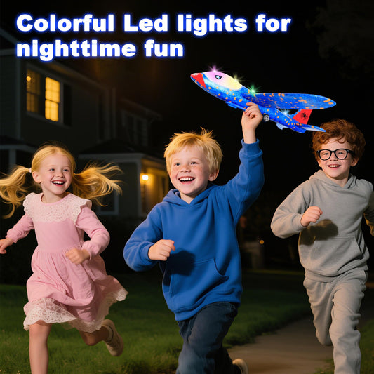 HitToys blue foam glider in flight with LED lights