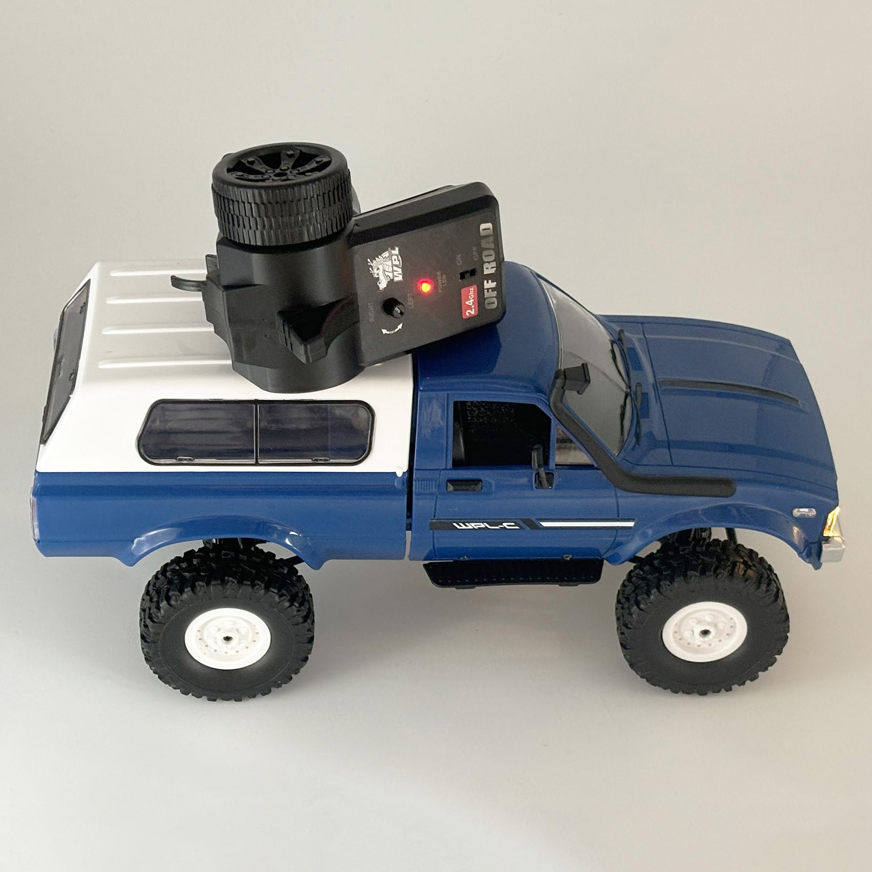 HLSFWDRIVE RC Crawler C24 packaging includes two batteries for extended play.