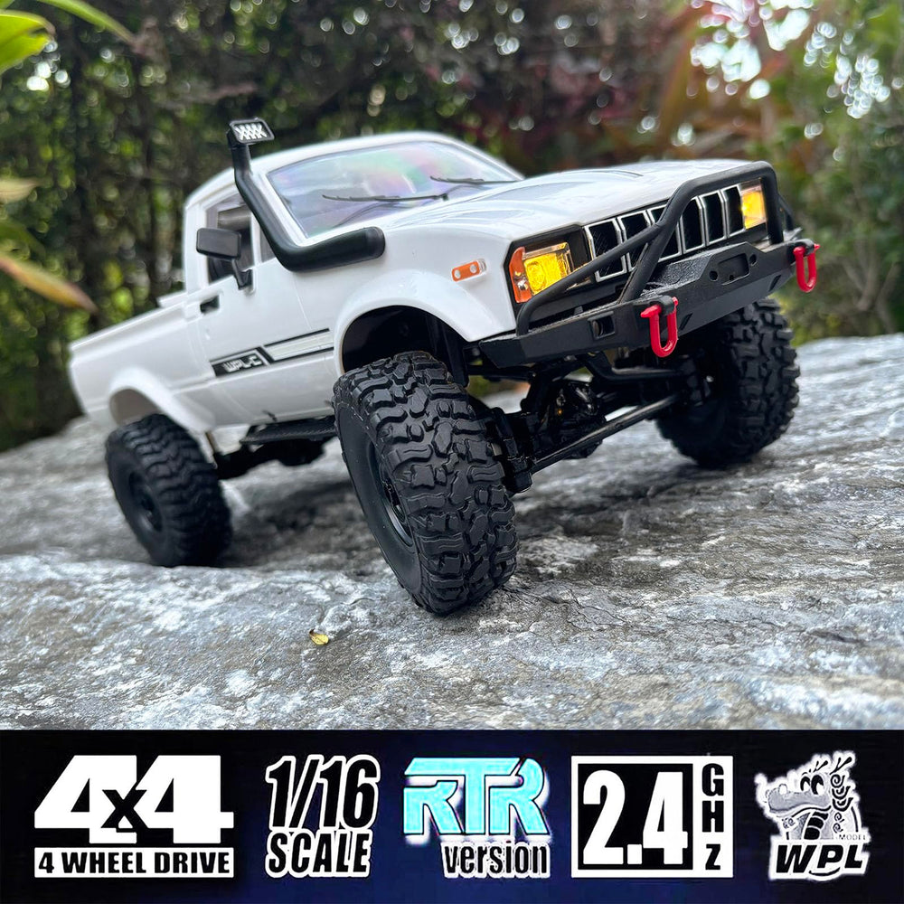 HLSFWDRIVE WPL C24-1 chassis close-up highlighting upgraded suspension system
