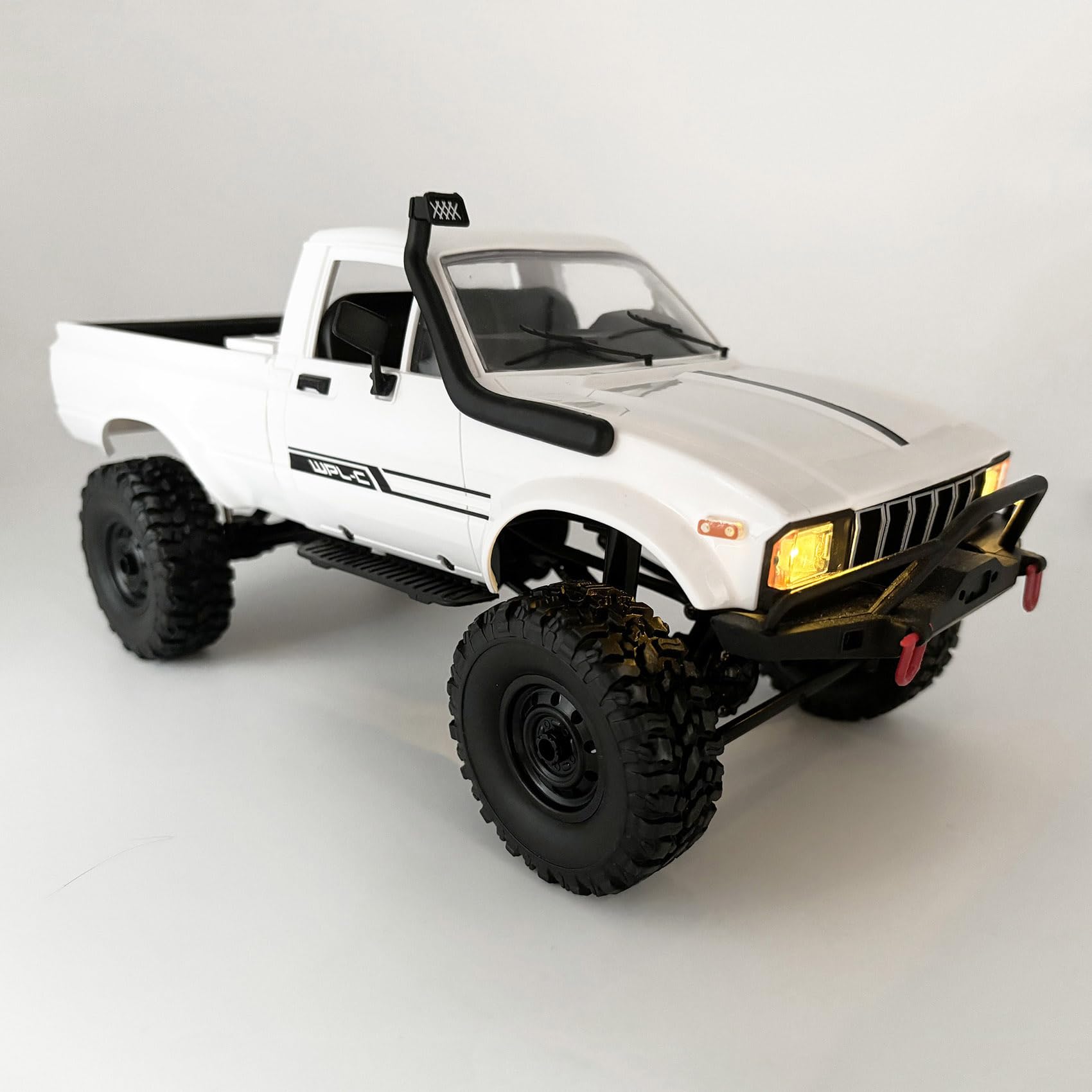 HLSFWDRIVE WPL C24-1 rock crawler front view with rugged chassis for off-road adventures