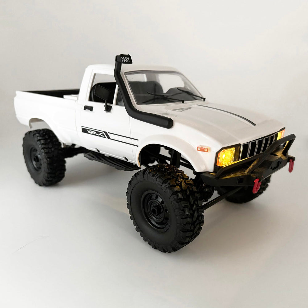 HLSFWDRIVE WPL C24-1 rock crawler front view with rugged chassis for off-road adventures