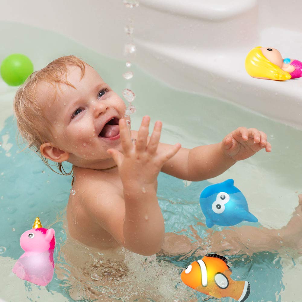 HLXY dolphin bath toy glimmers with color for imaginative play.