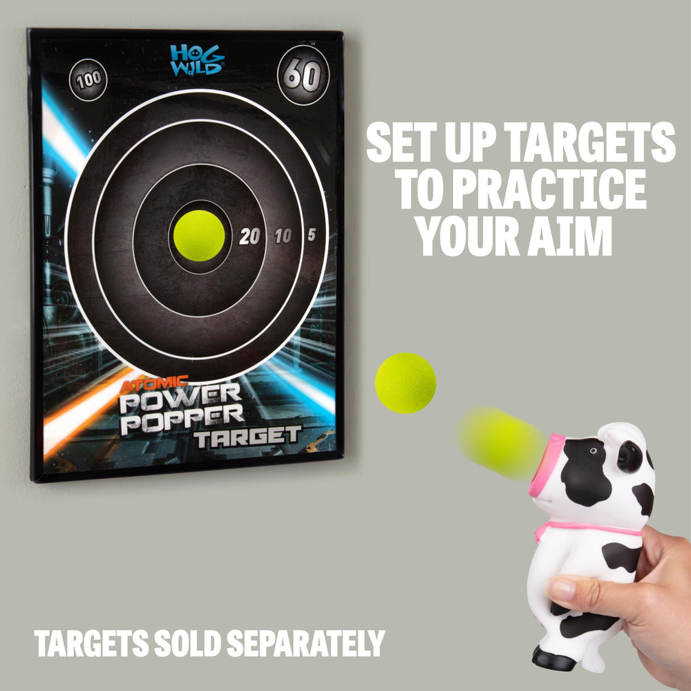 Hog Wild Cow Ball Popper includes four soft foam balls for versatile fun.
