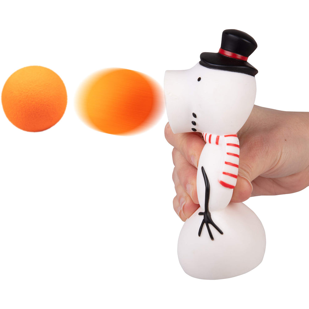 Hog Wild Snowman Ball Popper in action showing air-powered launch up to 20 feet.