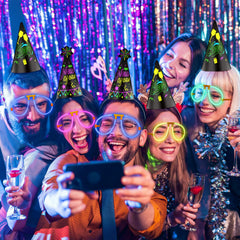 Hollowfly glow sticks illuminate hands and outfits for evening revelry.