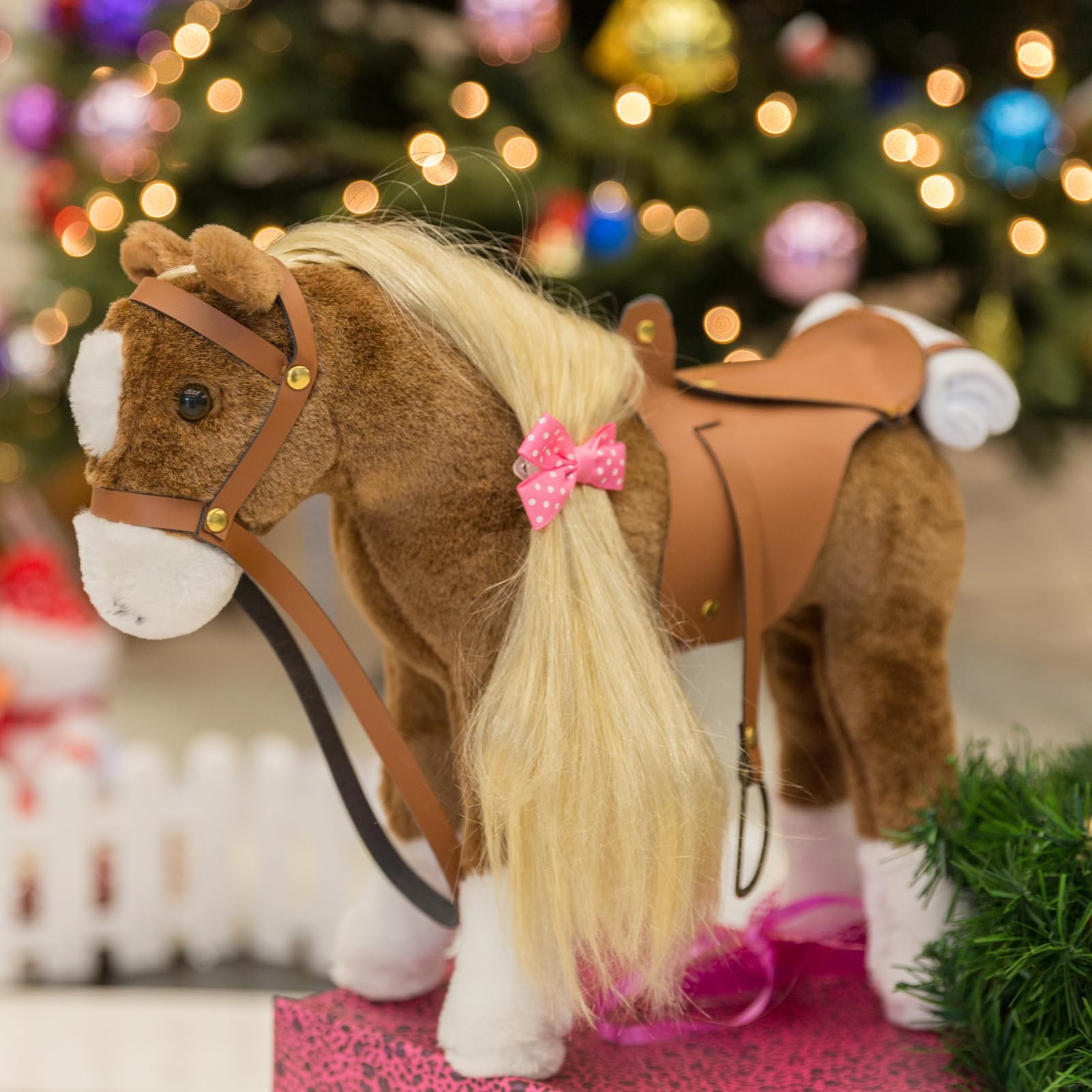 HollyHOME plush features a realistic leather saddle for authentic pretend riding moments.