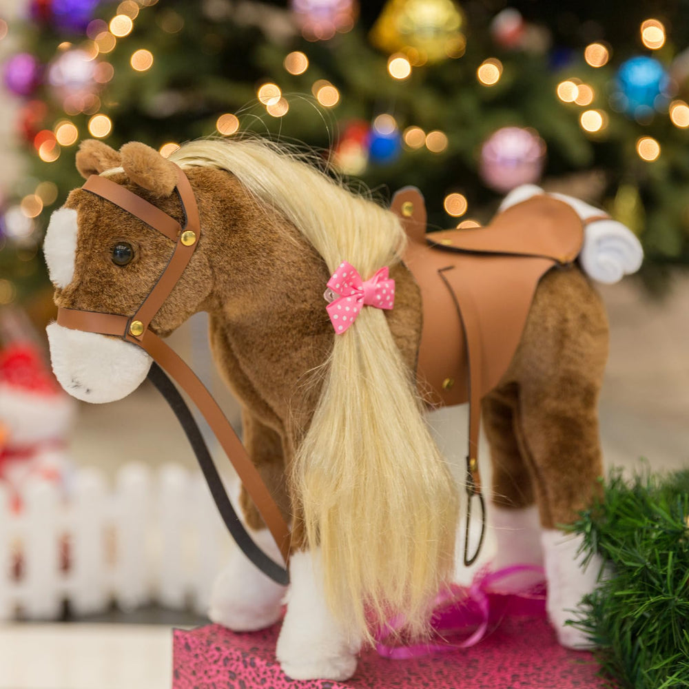 HollyHOME plush features a realistic leather saddle for authentic pretend riding moments.
