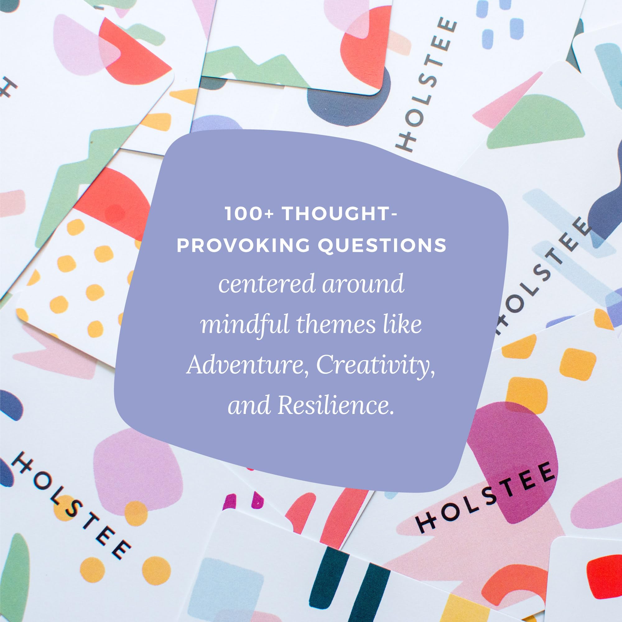 Holstee Reflection Cards open with vibrant designs inspiring thoughtful conversations.