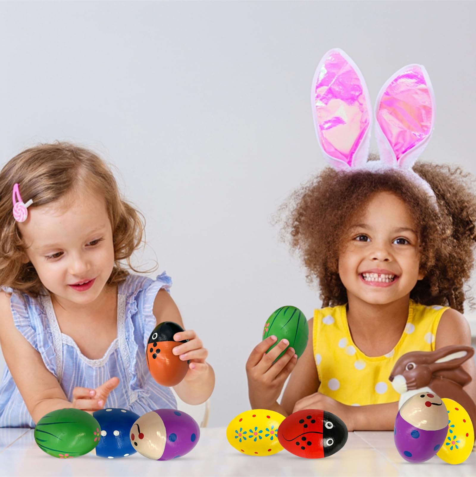 Homily wooden egg shaker with purple gingham supports motor skills and playful learning.